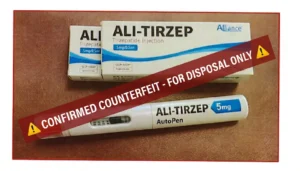 Two cartons and an injection pen labelled ALI-TIRZEP 5mg, overprinted with a banner reading Confirmed Counterfeit — For Disposal Only