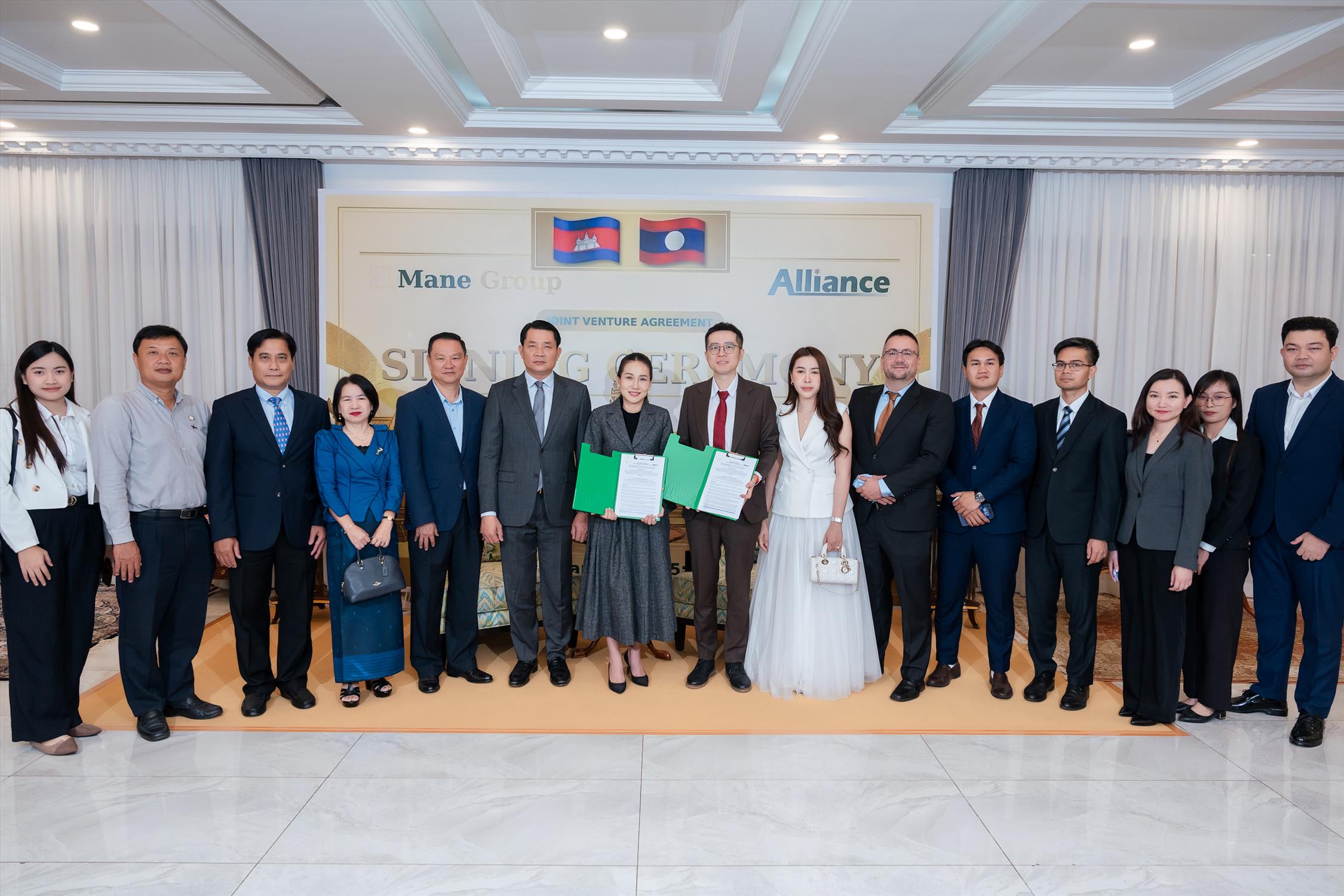 Alliance and Mane Group representatives at the PHANNTHAMIT signing ceremony